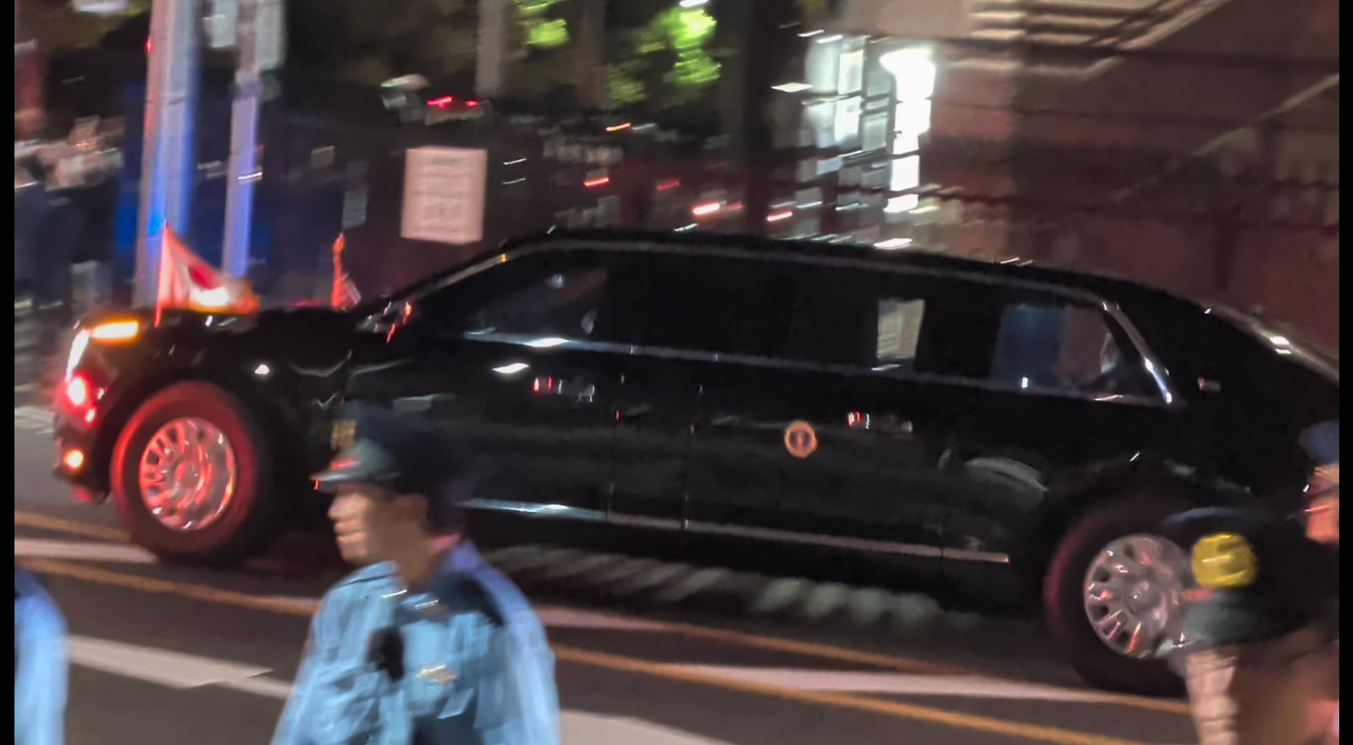 Still frame showing Trump in the vehicle